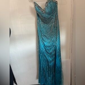 Tiffany Prom dress/ gown  blue lots of bedazzled size 8